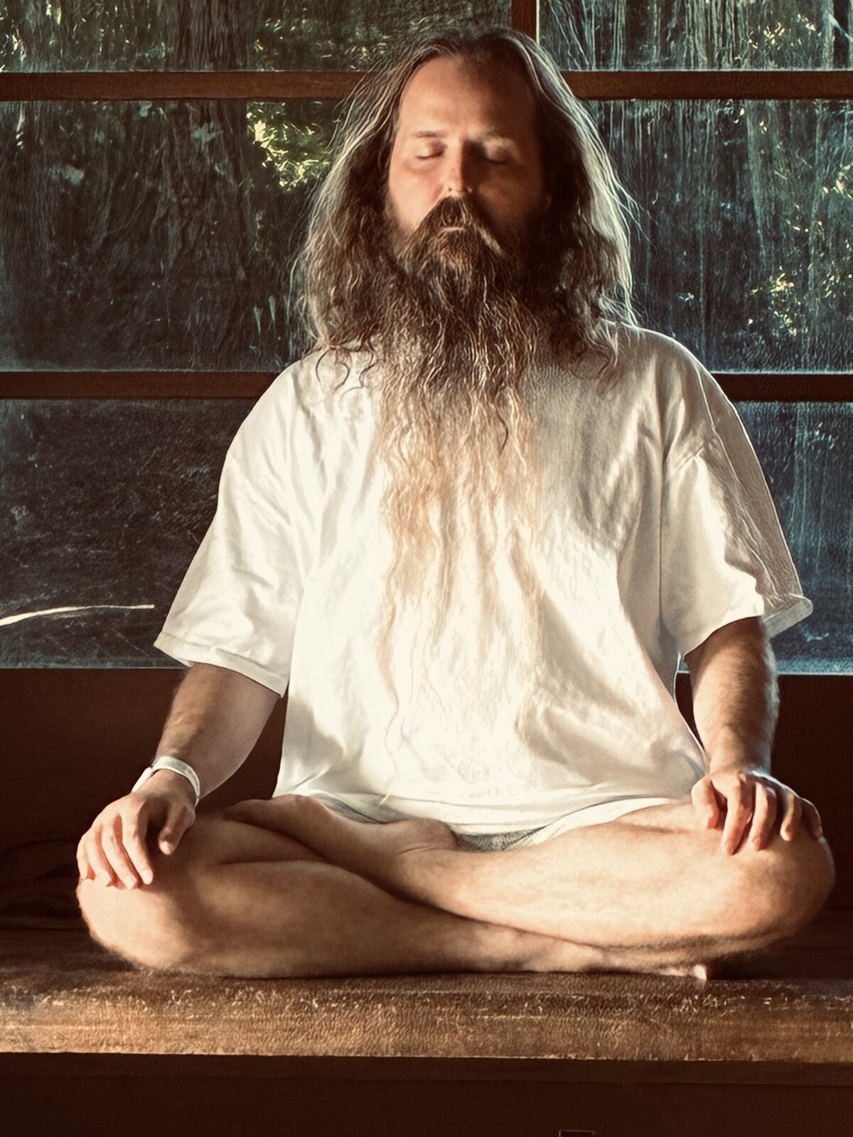 Adam Wes, The Bhakti Math Guru, seated in meditation